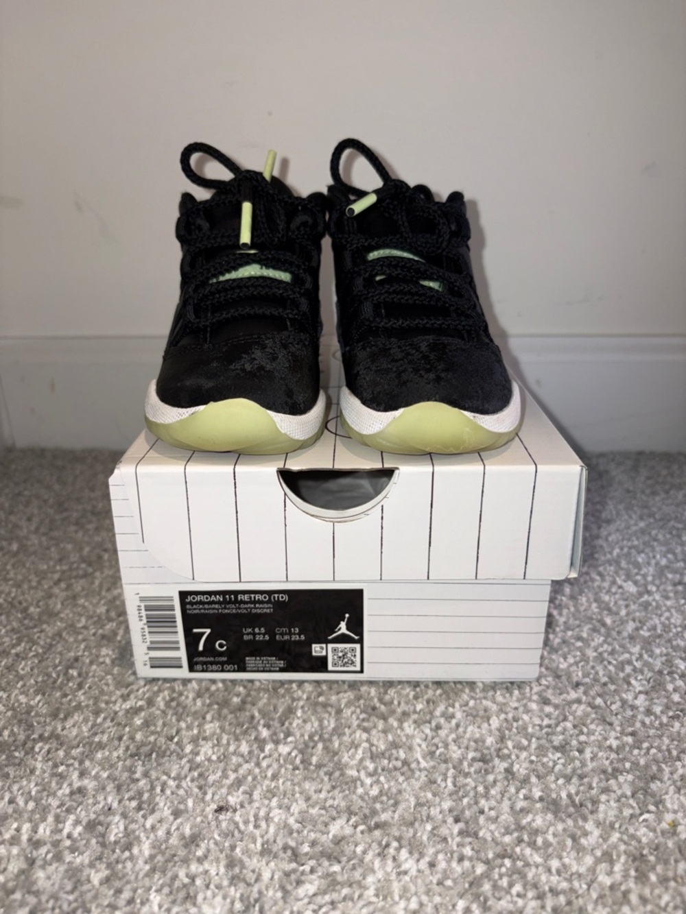 Jordan retro 11 barely volt Kids Black and Lime Sneaker Pair
